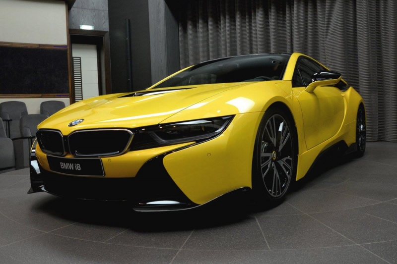 An incredibly good-looking yellow BMW i8!